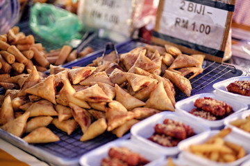 Asian, Indian and Chinese street food. Food court on local market of Langkawi island, Malaysia..Traditional asian street food.