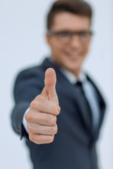 close up.modern businessman pointing at you