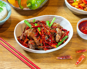 Chinese food on wooden table