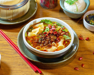 Chinese food on wooden table