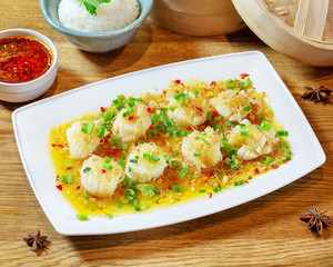 Chinese food on wooden table