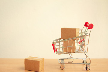 Parcel box in a trolley or shopping cart with ,E-commerce concept,delivery service concept.