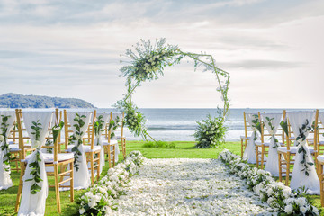 Romantic wedding ceremony on the beach in Phuket, Thailand.