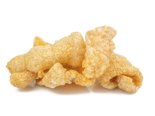 Fried pork rinds, pork snack, pork scratching and pork crackling isolated on white background