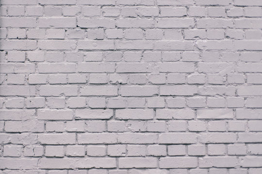 Fototapeta Grunge industrial grey painted brick wall background in Kyiv, Ukraine. May be used in design and interiors.