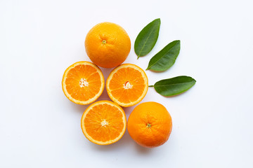 Fresh orange citrus fruit with leaves isolated on white background.  Top view