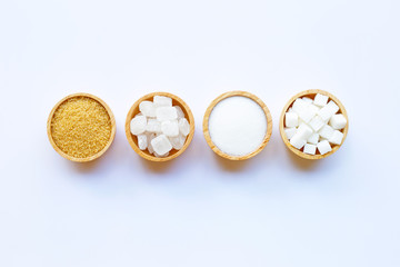 Fototapeta na wymiar Various types of sugar on white background.