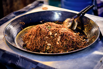Asian, Indian and Chinese street food. Food court on local market of Langkawi island, Malaysia..Traditional asian street food.