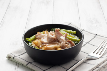 Fried noodle with pork and Chinese broccoli