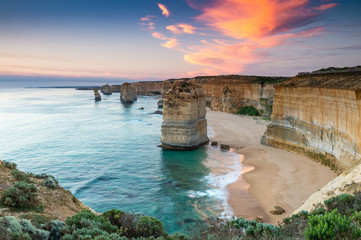 The rock stacks that comprise the Twelve Apostles at sunset in Port Campbell National Park. Great Ocean Road, Victoria State, Australia.