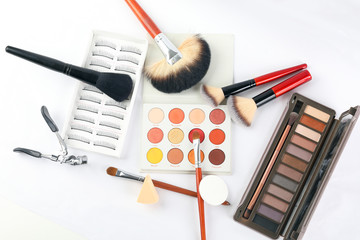 Beauty makeup face hair accessories beautician artist on white background copy space border frame top view