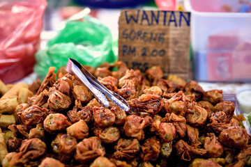 Fried Wantan - traditional asian street food. Asian, Indian and Chinese street food. Food court on local market of Langkawi island, Malaysia.