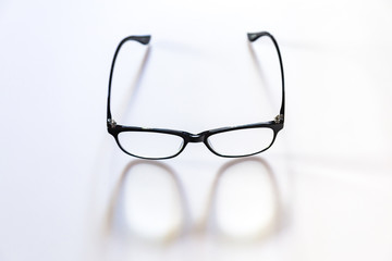 Black eye glasses spectacles with shiny black frame For reading daily life To a person with visual impairment isolaged on white background.