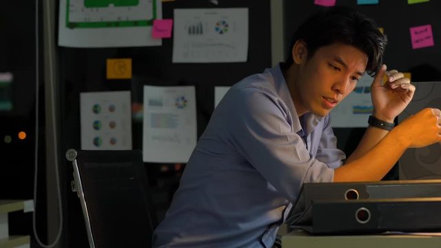 Businessman hard working to late night and work overtime at office. Manager assigns task after timeout of work. Concept of business management, assignment job late and working overtime.