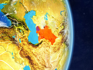 Turkmenistan on planet planet Earth with country borders. Extremely detailed planet surface and clouds.