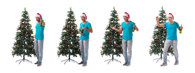 Young man decorating christmas tree isolated on white