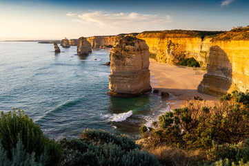 The rock stacks that comprise the Twelve Apostles at sunset in Port Campbell National Park. Great...