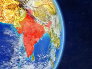 India on planet planet Earth with country borders. Extremely detailed planet surface and clouds.