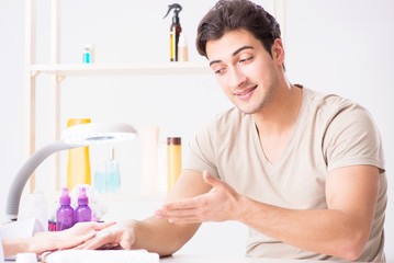 Fototapeta premium Hands during manicure care session