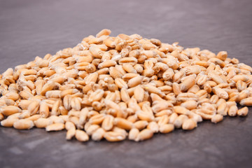 Heap of rye or wheat grains, agricultural concept