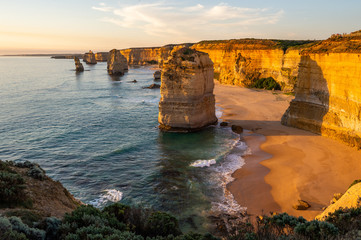 Fototapeta na wymiar The rock stacks that comprise the Twelve Apostles at sunset in Port Campbell National Park. Great Ocean Road, Victoria State, Australia.