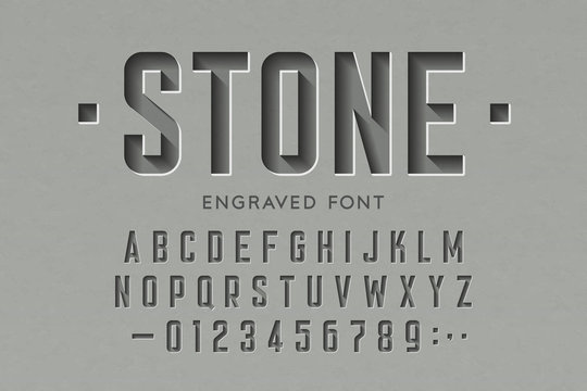 Engraved on stone font, alphabet letters and numbers
