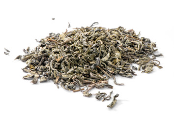 fermented green tea leaves heap close-up isolated on white background
