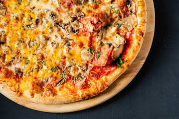 pizza on the black background