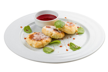 Cheesecakes. Cottage cheese pancakes with sour cream