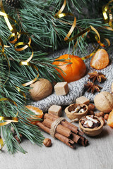 Still life formed with pine branches and New Year sweets