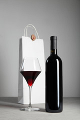 Decor of a bottle of alcoholic wine, a Christmas present.