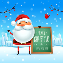 Merry Christmas! Santa Claus with message board in Christmas snow scene winter landscape.