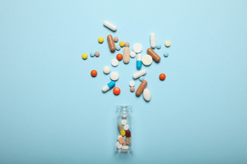 Pills and drug addiction. Antibiotic, aspirin, calcium. Emergency concept.