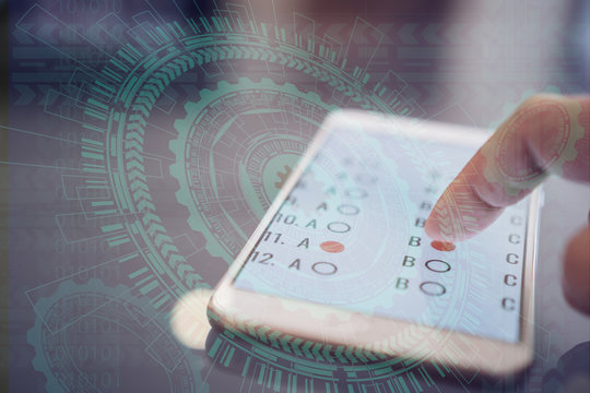 E-learning exam or online learning for student in smartphone by finger clicking multichoice with sci fi futuristic user interface virtual graphic touch, educational technology by internet