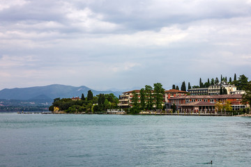 Fototapeta na wymiar Sirmione embankment od Garda lake, Lombardy, Italy.