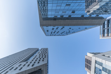 Fototapeta na wymiar Skyscrapers from a low angle view of unrecognized modern buildings