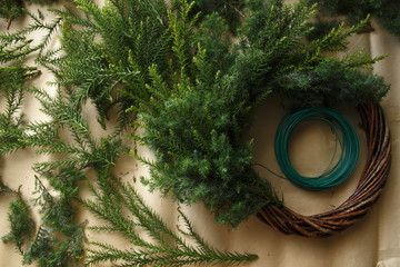 Make a wreath with branches such as fir