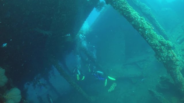 Scuba diving  diving course deep diver with instructor liberty wreck Tulamben indonesia Bali