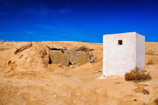 White building in Sahara desert, Tunisia, North Africa