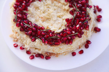 Christmas fruit cake, pudding on white plate. Copy space.