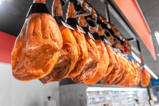 Traditional Spanish jamon ham for sale at the market