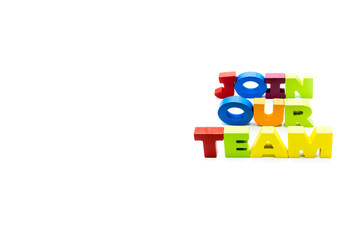 Join Our Team text written with colourful wooden letters, isolated over white with copy space on the left hand side
