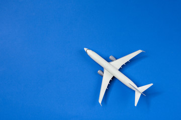 Naklejka premium Image of airplane isolated on empty blue background
