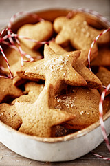 Home made gingerbread cookies in a vintage gift box as a Christmas present. Close-up