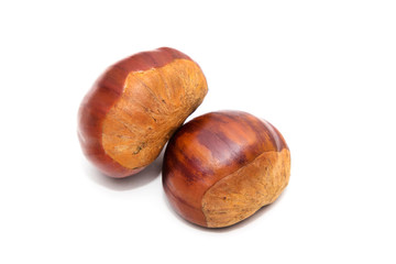 natural chestnuts isolated in white