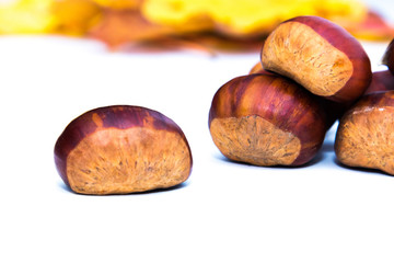 natural chestnuts isolated in white
