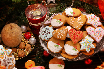 Christmas gingerbreads cookies on wooden table