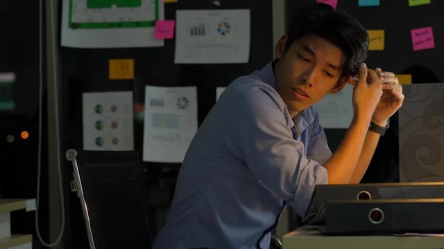 Businessman hard working to late night and work overtime at office. Manager assigns task after timeout of work. Concept of business management, assignment job late and working overtime.