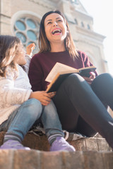 My daughter adores when I read stories in front of the church on Sunday