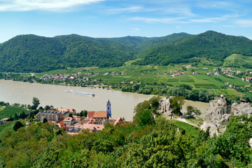 Fototapeta na wymiar Durnstein, Wachau, Austria. View of the village from the top, with the Burgruine Dürnstein in the foreground and the Danube in the background.
